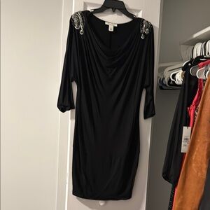 Elegant Black Dress with Embellished Shoulders